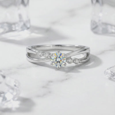 A solid gold ring with a simulated diamond.
