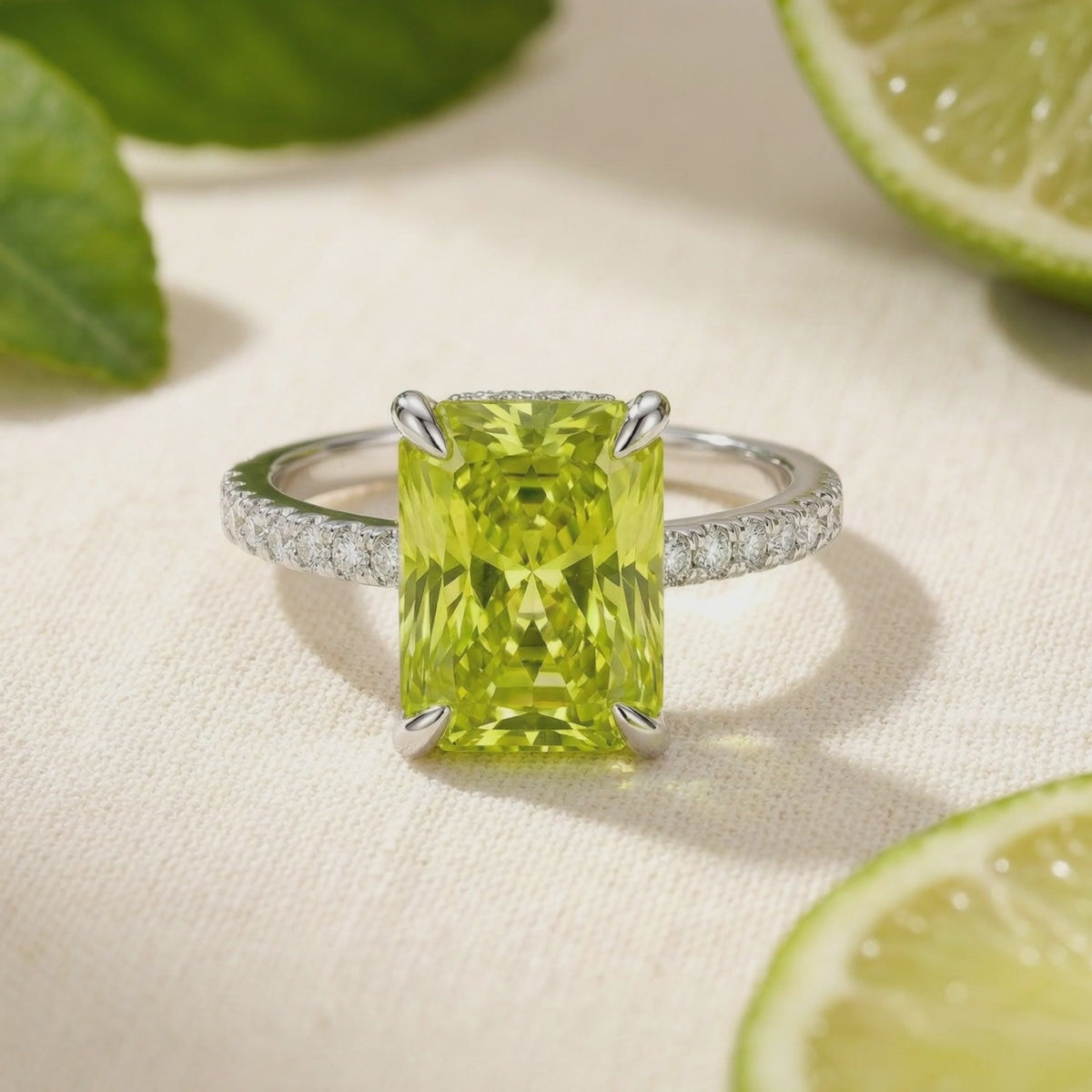 Radiant simulated peridot ring in solid gold.