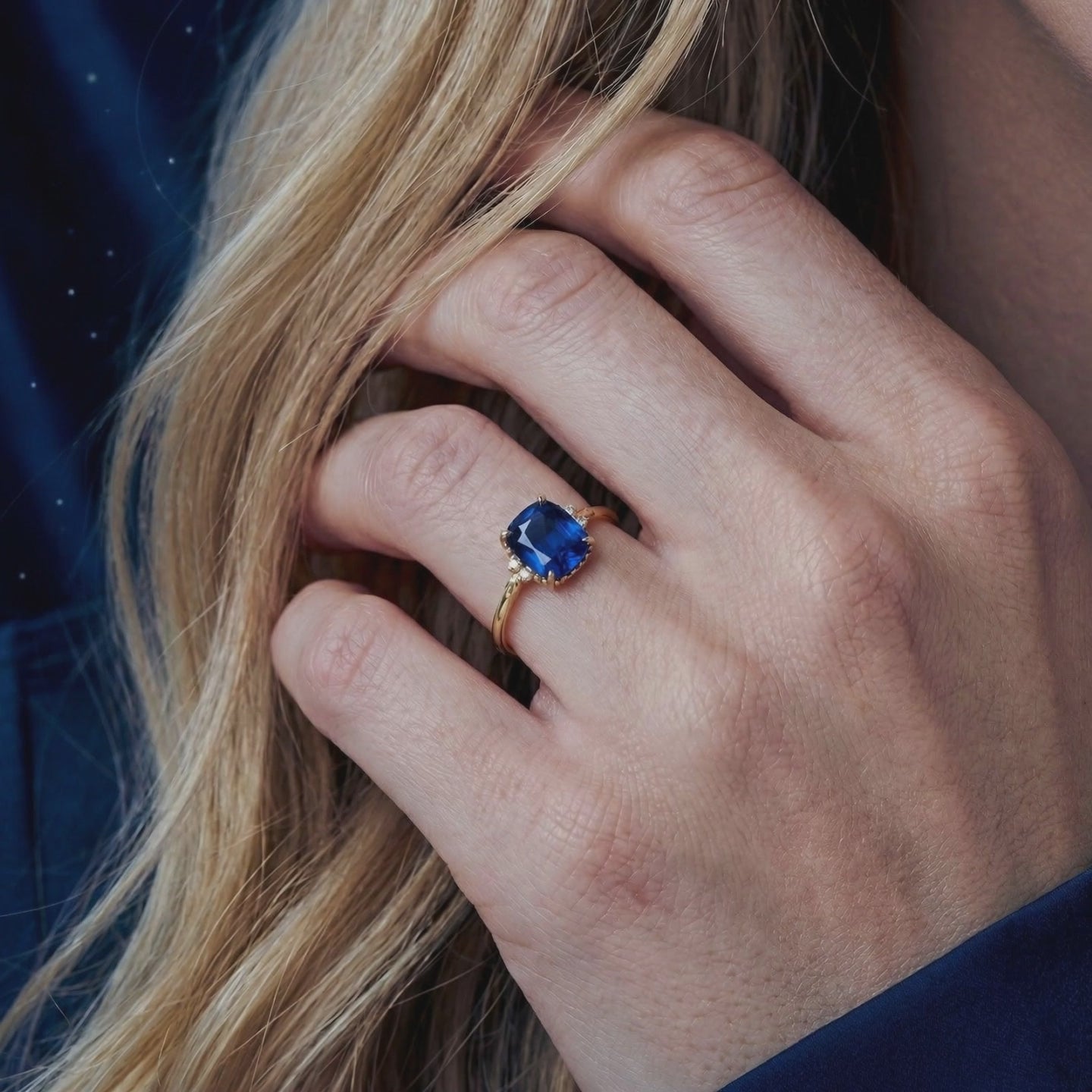 The Arisara simulated sapphire ring in solid gold.
