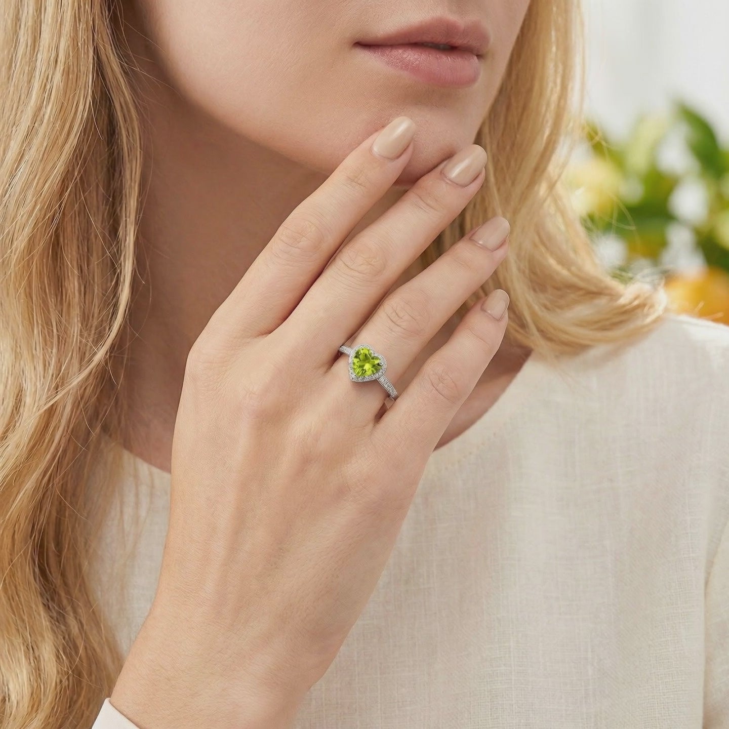 Elianelle heart-cut simulated peridot ring in solid white gold.