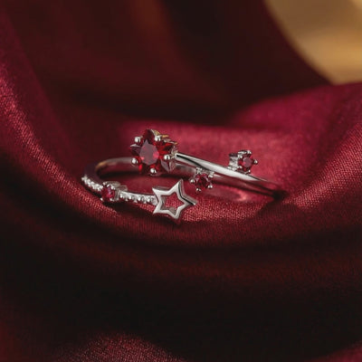 Lyriana Star solid gold ring with simulated ruby.