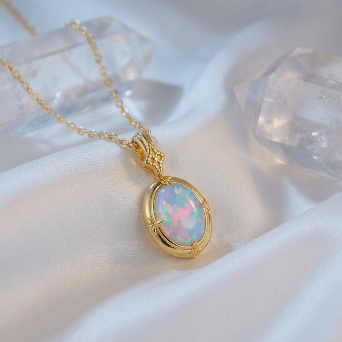 Natural white opal oval pendant necklace in solid gold.