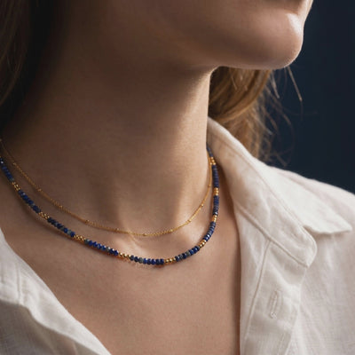 Solid gold layered Lapis Lazuli bead necklace.