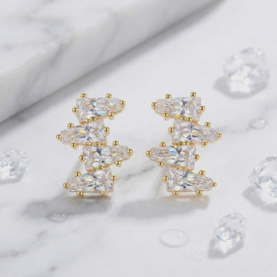 Solid gold cluster earrings with 5A Zirconia.